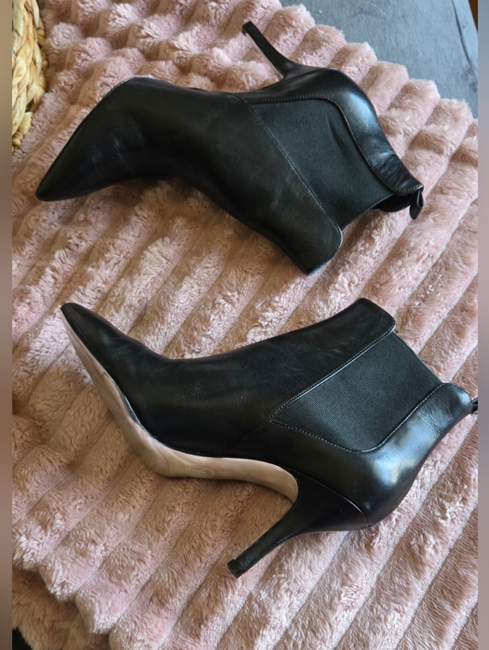 MICHAEL Michael Kors leather ankle booties in black.